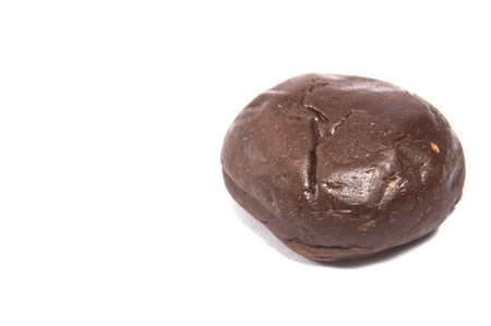 Dark brown dount on an isolated white backgroundの写真素材