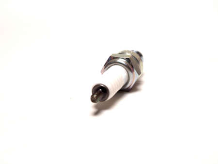Close up shoot of white spark plugs. Capture on white isolated background