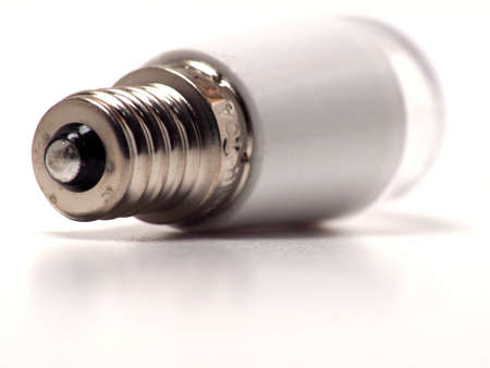 Close up shoot of white small led bulb with e12 socket. Isolated on white background.の写真素材