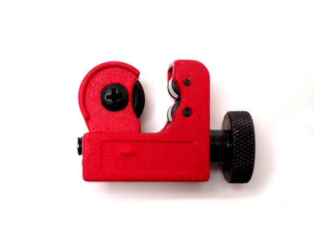 Picture of red mini pipe cutter that usually used by technician to cut small pipe. Shoot on isolated white background.の写真素材