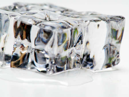 Close up shoot of ice cubes. Shoot on a white isolated background.