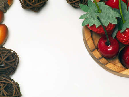 close up shoot of fruits and rattan balls. Shoot on a white isolated backgroundの写真素材
