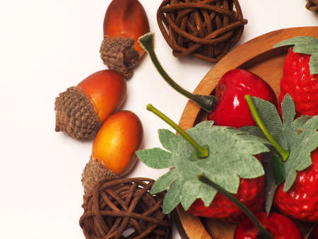 close up shoot of fruits and rattan balls. Shoot on a white isolated backgroundの写真素材