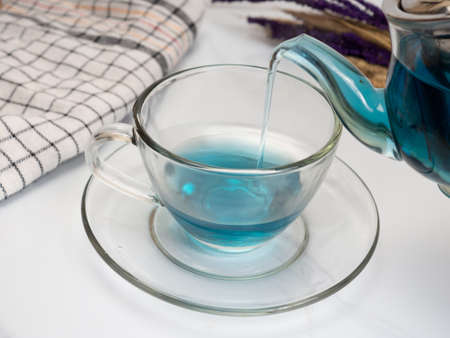 A cup of blue tea that made from buterfly pea flower or Clitoria Ternateaの写真素材