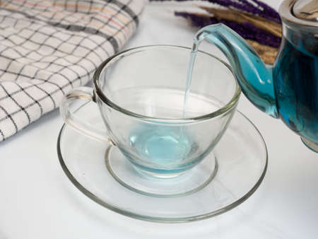 A cup of blue tea that made from buterfly pea flower or Clitoria Ternateaの写真素材