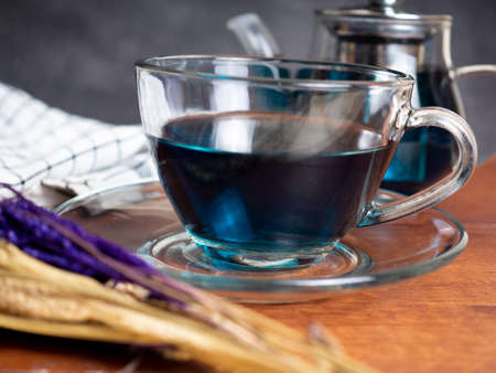 A cup of blue tea that made from buterfly pea flower or Clitoria Ternateaの写真素材