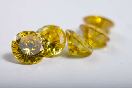 Macro shot of beautiful colored sparkling syntethic diamond that made from glass
