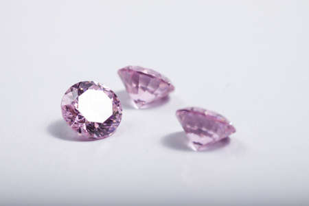 Macro shot of beautiful colored sparkling syntethic diamond that made from glass