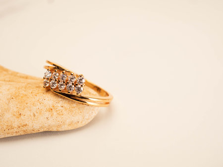 Close up shoot of gold wedding ring with beautiful diamondの写真素材