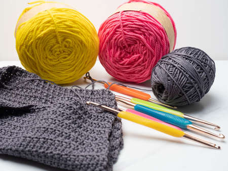 Close up shoot of knitting with crochet technique equipmentの写真素材