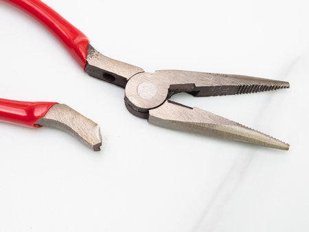 PIcture of a broken shap plier isolated on white