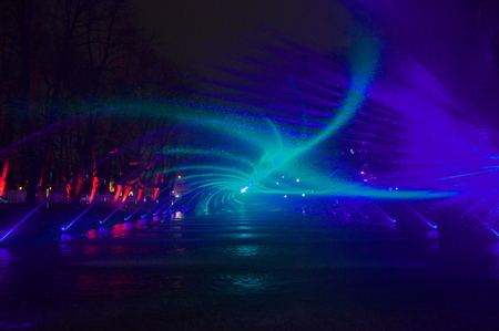 Riga, Latvia - November 17, 2018. Horizontal image of a spectacular water and multi-colored light and laser show FOREST OF SENSATIONS with fountain elements during Light Festival Staro Riga 2018のeditorial素材
