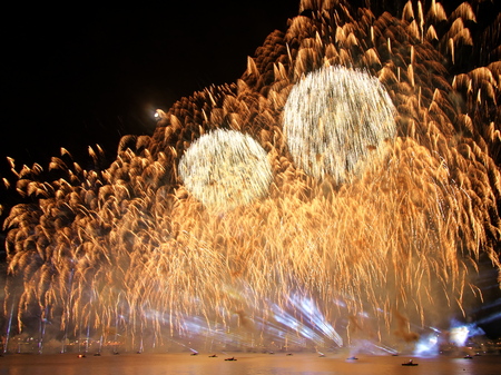 Riga, Latvia - November 18, 2018. Multi-colored fireworks exhibition Saules Muzs (The Life of the Sun) during programme of the the 100th anniversary of the Proclamation of the Republic of Latviaのeditorial素材