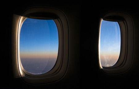 Clouds and sky as seen through window of an aircraft.の写真素材