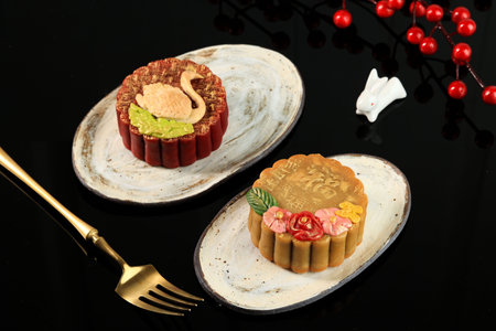 Luxury Mooncake with Lotus and Golden Rose Flower, Isolated on Black. Chinese Character is Fu means...