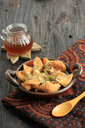 Tahu Gejrot is an Indonesian Fried Tofu in Sweet Spicy Sauce from Cirebon, West Java, Indonesia....