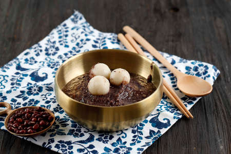 Korean Traditional Food Red Bean Porridge with Rice Cake, Popular as Patjuk Dongji