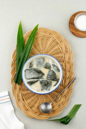 Cincau Hijau Green Grass Jelly in a Bowl, Served with Palm Sugar and COconut Milk for Takjil Ramdhan. Top View with COpy Spaceの写真素材