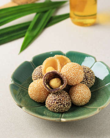 Onde-Onde is Traditional Food from Indonesia made from Glutinous Rice Flour with Beans Pasta, Coated with Sesame Seeds. Popular Indonesian Snack with Chinese influence.の写真素材