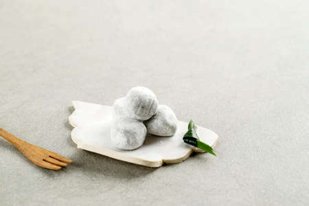 Japanese Mochi on Grey Background, Copy Space for Text. Selected Focus