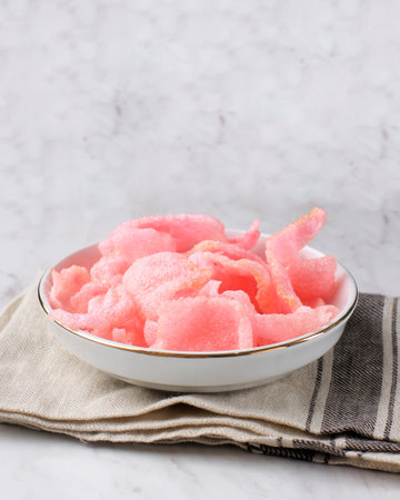 Red Crackers or Padang Crackers are processed crackers from red tapioca flour derived from natural dyes. Sprinkled on Padang soupy dishes, such as lontong vegetables, soto , asinan, pecel.の写真素材
