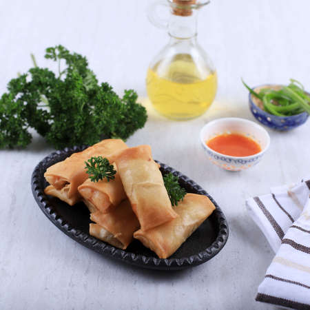 Homemade Spring Roll (Lumpia), Stuffed with Chicken and Shrimp, Served with Sour and Sweet Sauce, on...