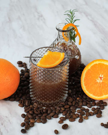 Iced Orange Espresso Coffee Mocktail Cold Brew Tonic Spritz on White Background, Copy Space for Textの写真素材