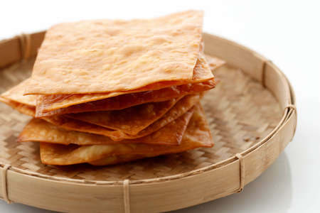 Deep Fried Wonton Wrapper Sheet or Pangsit Goreng, Crispy Dumpling for Cracker, Usually Served as...
