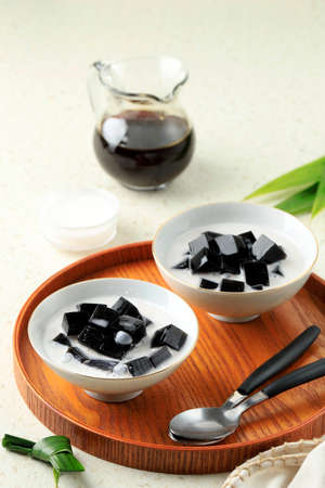 Es Cincau Hitam or Black Grass Jelly (Cincau Hitam), Indonesian Dessert Made from Cincau Leaf with Coconut Milk and Palm Sugar. Popular for Breakfasting during Ramadhanの写真素材