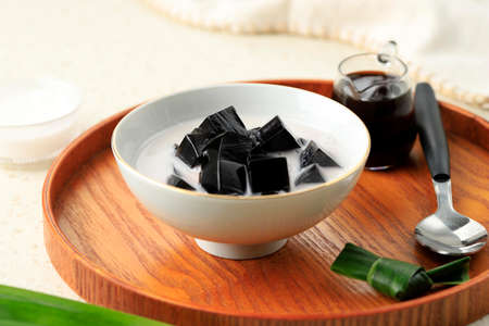 Es Cincau Hitam or Black Grass Jelly (Cincau Hitam), Indonesian Dessert Made from Cincau Leaf with Coconut Milk and Palm Sugar. Popular for Breakfasting during Ramadhanの写真素材