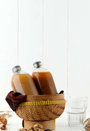 Jamu Gendong, Indonesian Traditional Herbal Drink, Clean White Concept. Copy Space for Text