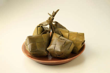 Ketupat, Diamond Shaped Rice Dumpling for Eid Mubarak, Center Focus with Copy Space for Textの写真素材