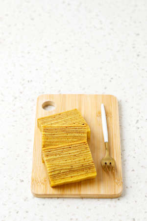 Lapis Legit, Indonesian Traditional Layered Cake on Cream Table, Copy Spaceの写真素材