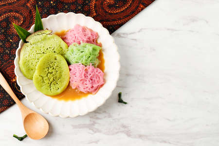 Top View Pethulo, Srabi and Putu Mayang Served with Coconut Milk Palm Sugar Syrup, Traditional...