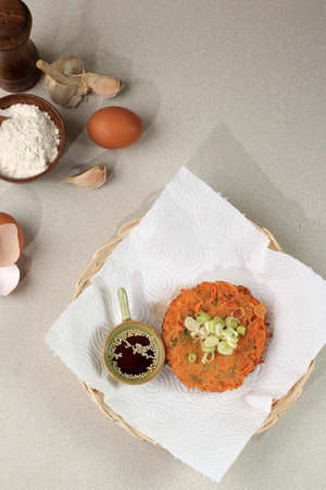 Korean Kimchi Pancake or Kimchijeon, Fried Mixed Egg, Kimchi, and Flour.  Top View Korean food style