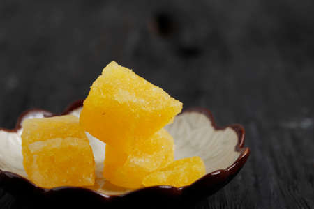 Yellow Rock sugar or Crystal Sugar, Popular in Indonesia for Traditional Herbal Drink Wedang Uwuhの写真素材