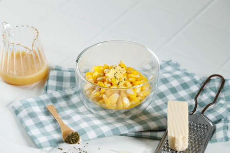 Steamed Fresh Corn with Butter on Transparan Bowl, Usually Served with Shredded Cheese, Dry Herbs,...