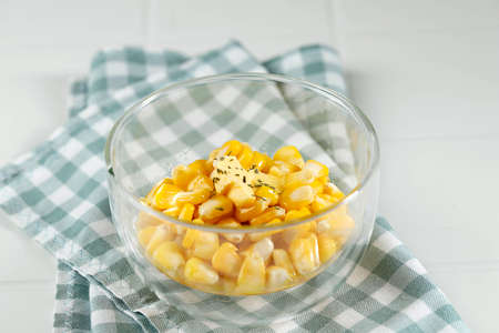 Buttered Corn or Sweet Corn with Melted Butter and Dried Herbsの写真素材