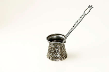 Ibrik Turkish Coffee Pot Isolated on White, Copy Space for Textの写真素材