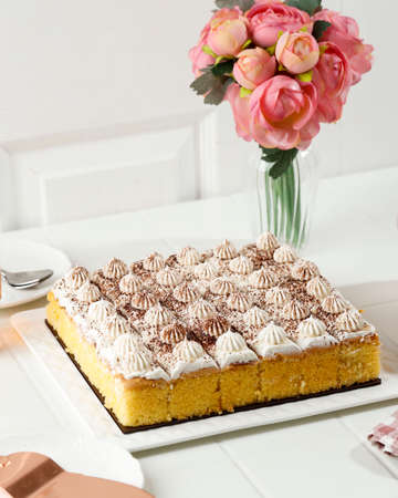 Mini Tiramisu Cake on White Plate, Concept White Bakery