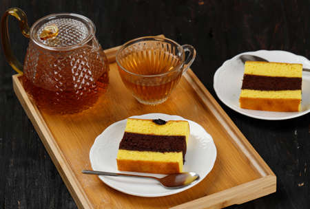 Spiku Lapis Surabaya, Three Layer Cake Vanilla with Chocolate in the Middle. Every Layer with Jam....