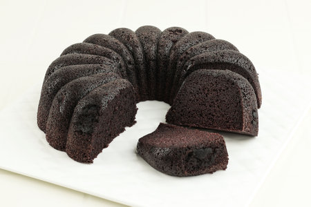 Black Sticky Rice Cake or Bolu Ketan Hitam, Typical Indonesian Cake Made from Black Sticky Rice Flour, Sugar and Eggs.の写真素材