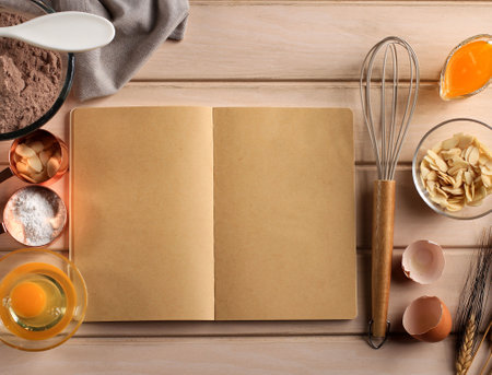 Empty Open Book with Baking Ingredients, Top View. Concept Book Recipe for Advertisementの写真素材