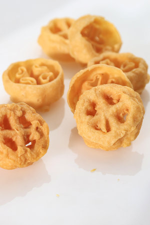 Kue Kembang Goyang or Kuih Loyang, Indonesian and Malaysian Traditional Crispy Snack, Deep Fried...