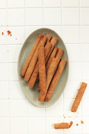 Kue Semprong or Waffle Egg Rolls, Indoneisan Traditional Cake Snack made from Flour and Sugar and...