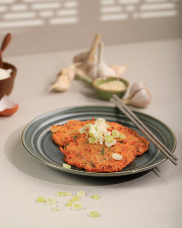 Kimchi Jeon, Korean Kimchi Pancake, made from Eggs, Fermented Vegetable, Carrot, and Flourの写真素材