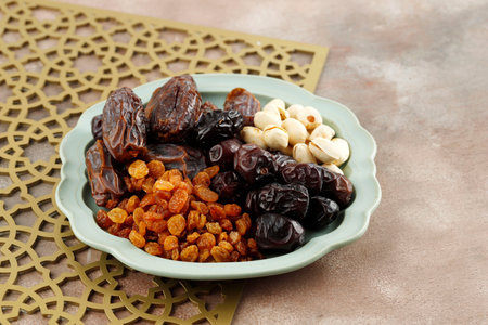 Various Snack for Sweet Takjil Iftar Moslem Ramadan Month, Pistachio, Dates Fruit, and Golden Raisin.の写真素材