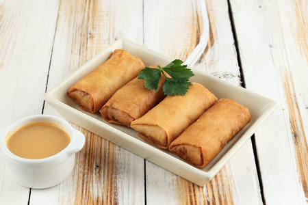 Lumpia or Loenpia Goreng, Deep Fried Spring Roll Served with Peanut Sauce, Usually Filled with...