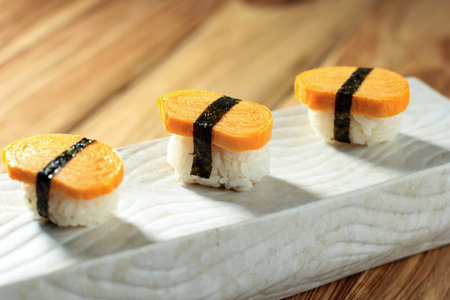 Tamago Nigiri Egg Sushi with Nori, Close Up