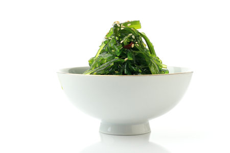 Chuka Wakame Salad Japanese Food on White Bowl, Isolated on Whiteの写真素材